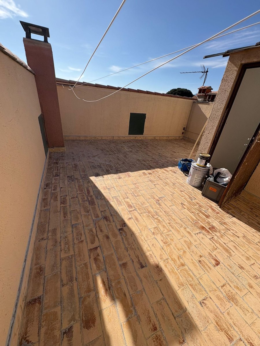 Toit terrasse : ponçage de ancien revêtement